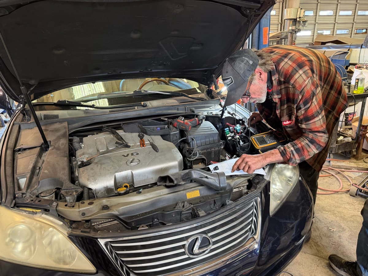 John Wanarski diagnosing a vehicle at JW Auto Service